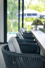 bar stool with cushion  at a bar counter