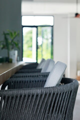 bar stool with cushion  at a bar counter