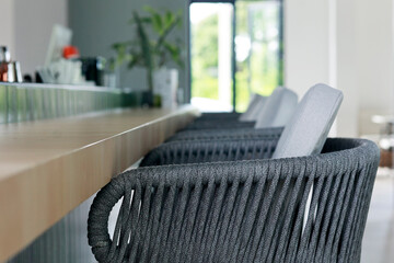 bar stool with cushion  at a bar counter