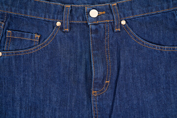 Close up of classic blue jeans textile. Detail of denim pants.