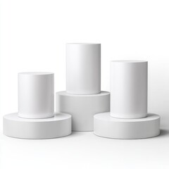 Three white cylindrical display stands (1)