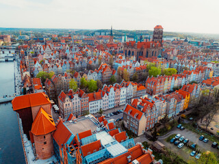 Gdansk with Motlawa river in Poland. Aerial landscape of the Main Town. Old town colourful house with saint Marys church