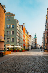 Fototapeta premium Gdansk with Motlawa river in Poland. Old town colourful house with saint Marys church i main square.