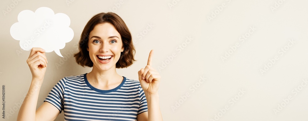 Poster smiling woman holding blank speech bubble and pointing up against light background with copyspace fo