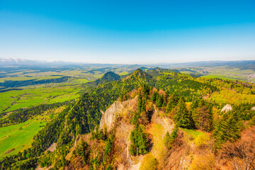 Hiking to peak Tri Koruny or Trzy Korony during day. Pieniny National park in Poland. View from the...