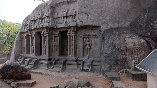 UHD 4K / 60 FPS Video - Exclusive Monolithic Rock Carved - Thirumoorthi Cave Temple is UNESCO's World Heritage Site located at Mamallapuram or Mahabalipuram, Tamil Nadu, South India. World wonder site