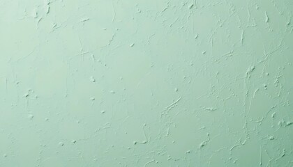 Minimalist pastel green wall background with high-definition plaster texture.

