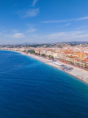 Fototapeta premium Aerial view of sea, shore and city of Nice, France shot with a drone