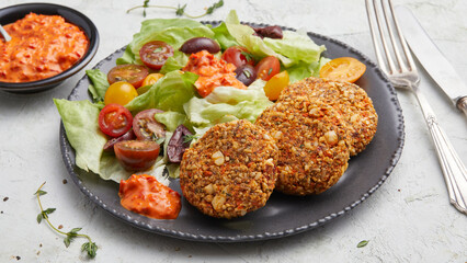 Veggie patties with salad 