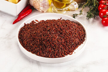 Red raw dry rice gor cooking