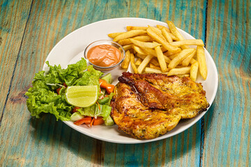 Grilled chicken fillet with french fried potato