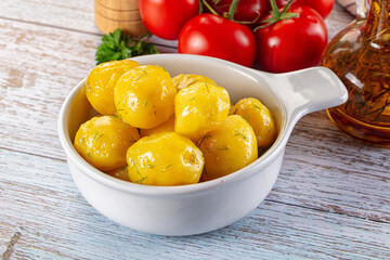 Boiled young potato with oil