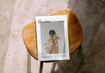 Mockup Of Customizable Closeda4 Magazine On Stool