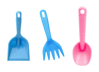 Blue and pink plastic children's toy shovels and rake set for beach sand scooping on an isolated transparent background.