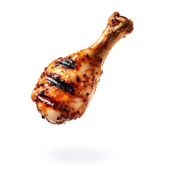 A perfectly grilled chicken drumstick, with visible char marks, suspended in mid-air against a pure white background.