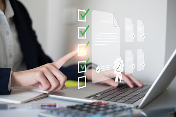 Close-up hand businessman doing checklist document survey list quality questionnaire choice form mark concept