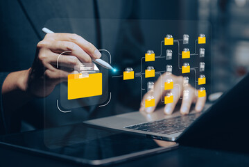 Digital File Organization: Hands using stylus on tablet managing virtual folders, illustrating data...
