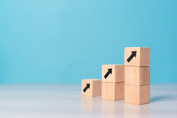 Business growth on wooden block