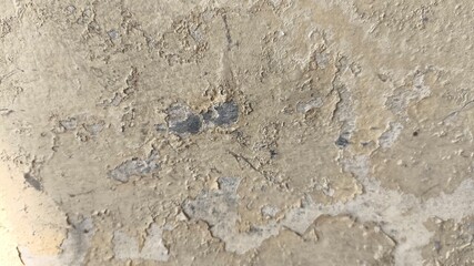 Textured wall surface with horizontal cracks and worn paint layers, aged and weathered appearance for creative backgrounds, architectural details, grunge design, and rustic visual elements.