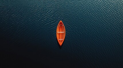 Tiny Bright Orange Canoe Drifting on a Deep, Shadowy Lake 
