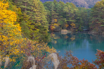 Bishamon-numa Pond is the largest and most popular pond. The colorful pond reflecting sunlight is a...