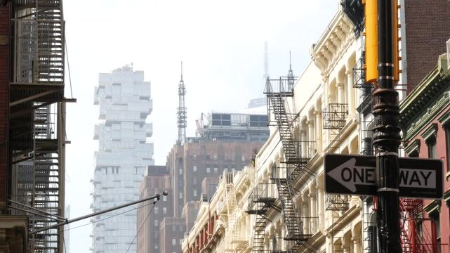 New York City Manhattan Soho fashion district near Broadway street. USA urban building facade, old classic american architecture. Shopping in NYC, United States. Business and residential real estate.