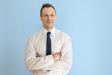 Portrait of handsome caucasian man in formal suit looking at camera smiling with toothy smile isolated in white background. Confident businessman ceo boss freelancer manager