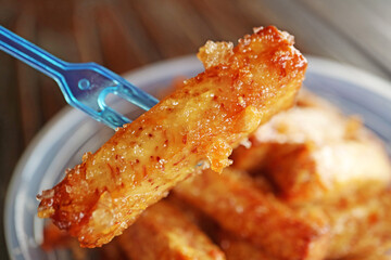 Closeup of Mouthwatering Deep Fried Sugar Coated Taro Sticks
