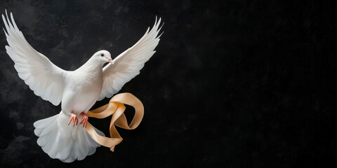 White dove flying with golden ribbon on black background