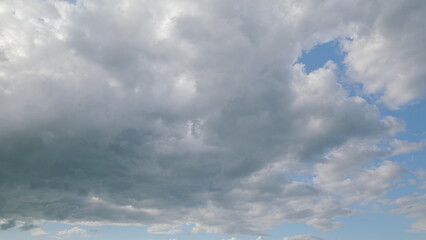 A Dramatic and Beautiful Cloudy Sky Displaying Magnificent Blue Patches of Color and Light