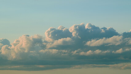 Enjoy the Beautiful, Dramatically Cloudy Skies at Dusk that Create a Vibrant Atmosphere