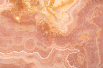 Exquisite Pink Rainbow Onyx background, texture in beautiful warm tone as part of your new stylish design.