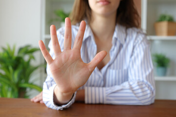 Woman hand at home gesturing number five