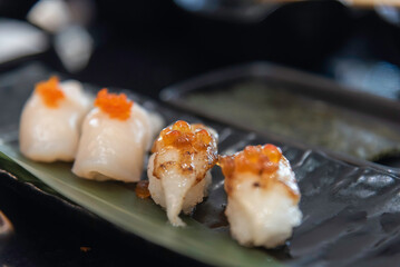 Sushi is a Japanese food, rice balls with toppings
