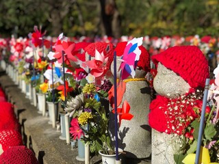Jizo statues at a temple in Japan, symbol for miscarried children!