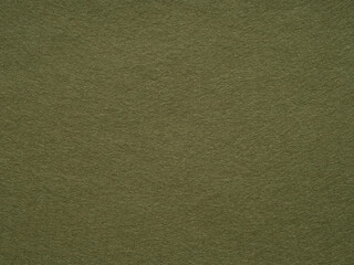 Uniform olive green felt texture offers a canvas of natural elegance and minimalist design