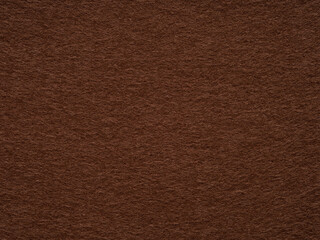 The richness of cocoa felt unfolds, a portrait of earth's essence woven into a tactile masterpiece