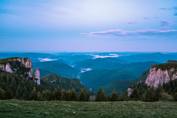 Mountains landscape with blue sky.  Night scene of a view from mountain  summit in Carpathian Mountains. 