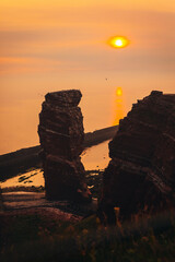 Cliffs of the German island of Heligoland at sunset in the north sea