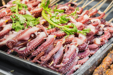 Fresh octopus tentacles on a stick