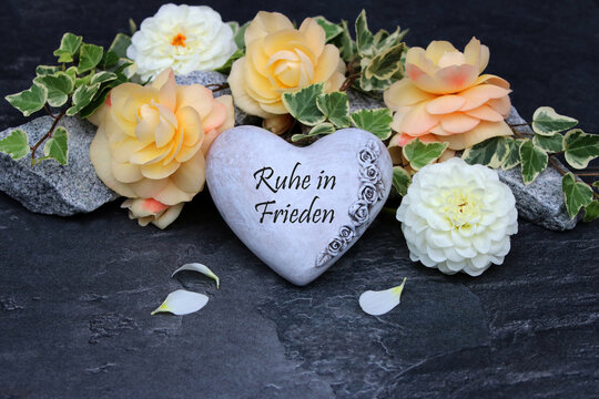 Herz mit dem Trauerspruch Ruhe in Frieden.