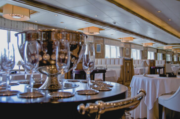 Formal and elegant ocean view dining room restaurant onboard luxury cruiseship or cruise ship liner...