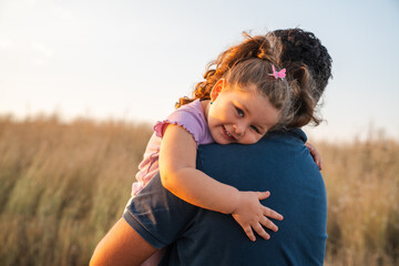 Portrait of happy daughter with her father.
