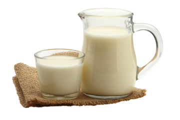 A refreshing glass and pitcher of creamy milk representing wholesome nutrition and a healthy start isolated on transparent background. Generative Ai.