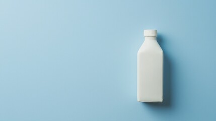 Milk carton mockup on light blue background, centered with clean layout
