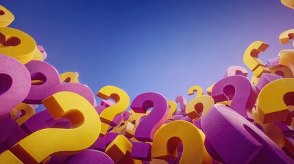 Question marks in a pile against a blue sky