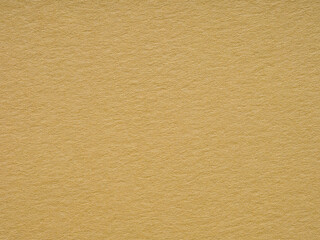 A vivid yellow backdrop highlights the intricate texture and delicate fibers woven through this premium paper surface