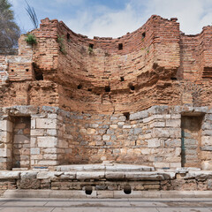 The historic Nymphaeum Traiani in Ephesus, an impressive structure made of stone and brick, highlighting ancient craftsmanship in Selcuk, Turkey