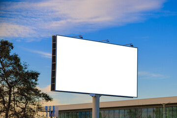 Fototapeta premium Large white billboards for outdoor advertising and information boards along the roads and on the streets of the city. 