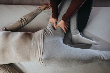 Massage therapy session focusing on muscle relaxation and therapeutic techniques in a tranquil...